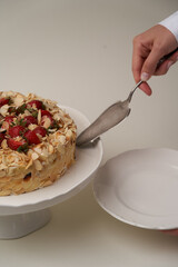 Strawberry cake with cherry and almond