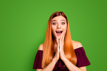 Portrait of red straight-haired attractive cute nice happy young girl, clapping palms, excited,...