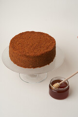 Chocolate honey cake on a white background