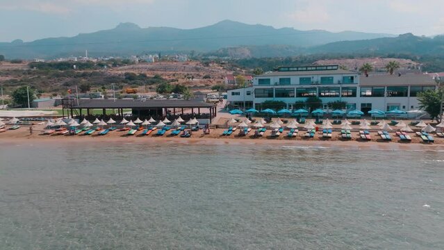 Tourist group enjoy visiting Kaplıca Beach in Kyrenia, North Cyprus