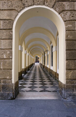 Street of the city of Cadiz, Spain. arches of the town hall