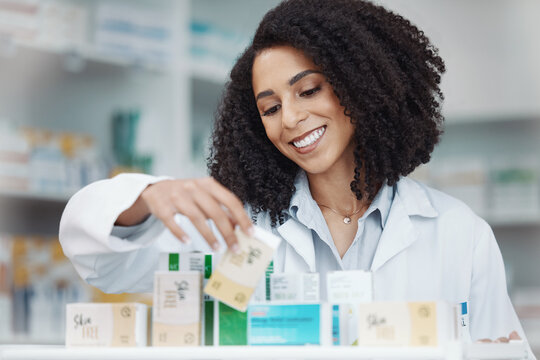 Pharmacy, medicine and smile with woman in store for healthcare, drugs dispensary and treatment prescription. Medical, pills and shopping with pharmacist for check, label information or product