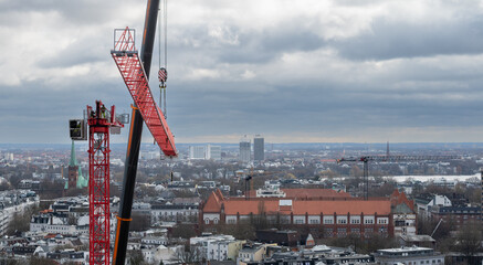 Assembling a construction crane in Hamburg, Germany.