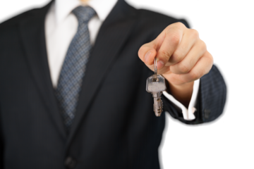 Businessman Handing over the Keys