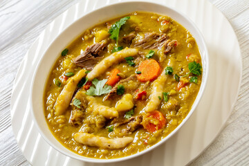 gungo peas soup with dumplings, veggies and beef