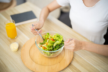 Asian woman dieting Weight loss eating fresh fresh homemade salad healthy eating concept