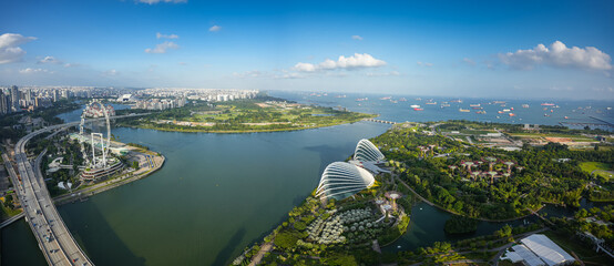 Singapore panorama panorama from above. Aerial view of Singapore skyline with harbour, gardens tree from bay and the big wheel. Travel to Singapore.