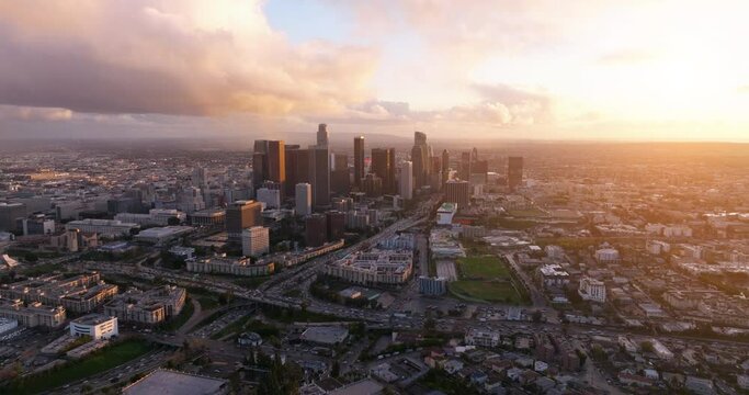 Los Angeles, California skyline and skyscrapers from above on a sunny day during golden hour before sunset. Los Angeles Downtown Sunset Skyline. Aerial of downtown Los Angeles in dawn. 