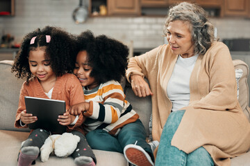 Watching, movie and children with grandmother and a tablet for games, education or website. Interracial, digital and girls playing on technology, streaming a show and film with a senior woman