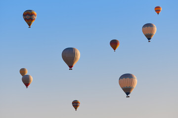 Spectacular balloons flying at sunrise in Goreme. Turism Cappadocia, Turkey