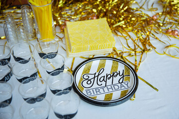 Happy birhday decor for party, in yellow and golden colors