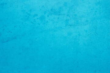 Obraz premium Blue dark concrete texture for background in summer wallpaper. Cement colour and sand wall of tone vintage. Abstract teal dark color. 