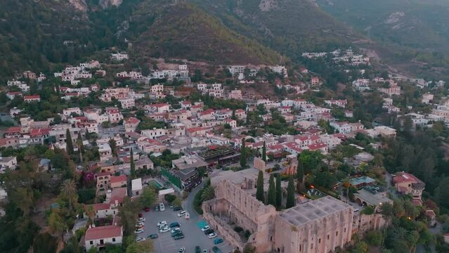 Bellapais Monastery aerial sunset view in Bellapais village, North Cyprus