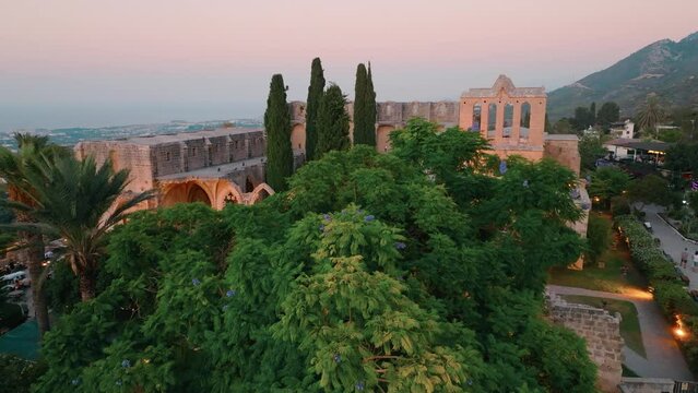 Bellapais Monastery aerial sunset view in Bellapais village, North Cyprus