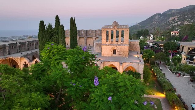 Bellapais Monastery aerial sunset view in Bellapais village, North Cyprus
