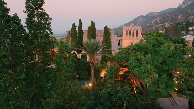 Bellapais Monastery aerial sunset view in Bellapais village, North Cyprus