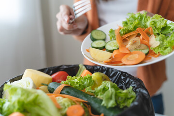 people put bio trash from food waste in domestic homes to compost bins to make fertilizer to reduce global environmental pollution.