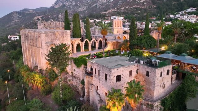 Bellapais Monastery aerial sunset view in Bellapais village, North Cyprus