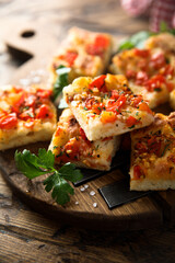 Traditional homemade focaccia with tomatoes
