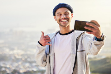 Fitness, man and sunset with smile for selfie on mountain in social media, vlog or profile picture in nature. Happy male hiker smiling for photo, memory or online post in healthy wellness outdoors