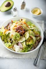 Healthy vegetable salad with avocado
