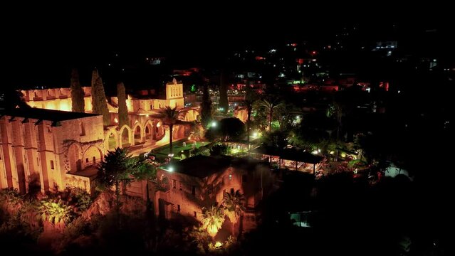People enjoy dinner at Bellapais Monastery, North Cyprus