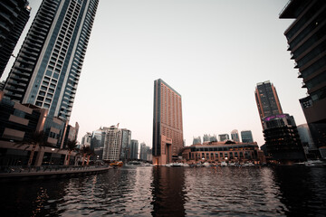 Fototapeta na wymiar Dubai Marina is a rich residential area known for The Beach at JBR ,The Dubai Marina Walk is lined with modern cafs and one-day craft stalls,common and luxury