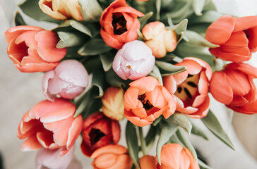 a bouquet of tulips of different colors