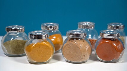 Spices for cooking - Cumin, paprika, curry, turmeric, chilli pepper, pepper, salt, ginger are typical spices of African Moroccan Indian cuisine - health and well-being in  kitchen - Mediterranean diet