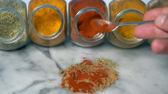 Spices for cooking - Cumin, paprika, curry, turmeric, chilli pepper, pepper, salt, ginger are typical spices of African Moroccan Indian cuisine - health and well-being in  kitchen - Mediterranean diet