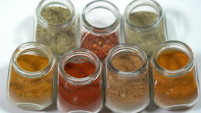 Spices for cooking - Cumin, paprika, curry, turmeric, chilli pepper, pepper, salt, ginger are typical spices of African Moroccan Indian cuisine - health and well-being in  kitchen - Mediterranean diet