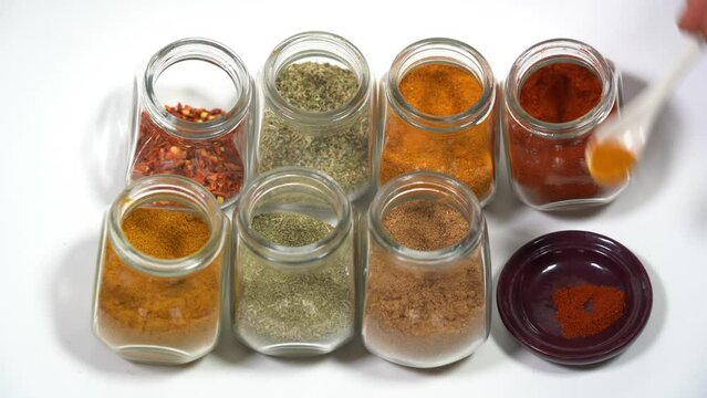 Spices for cooking - Cumin, paprika, curry, turmeric, chilli pepper, pepper, salt, ginger are typical spices of African Moroccan Indian cuisine - health and well-being in  kitchen - Mediterranean diet