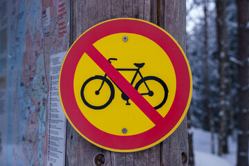 No biking sign at the entrance of Repovesi National Park in winter. Finland.