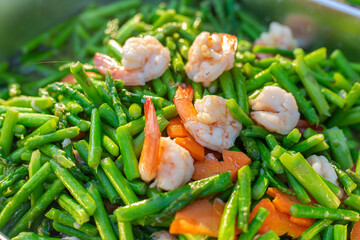 Top view of delicious meal stir fried asparagus and shrimp with ingredients oyster sauce. asian homemade style food concept.