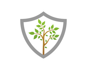 Growing tree inside the shield logo