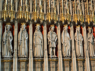 Interior details of York Minster showing a logically carved stone figures
