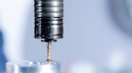 Macro photo Work drilling CNC on industry factory, blue color banner