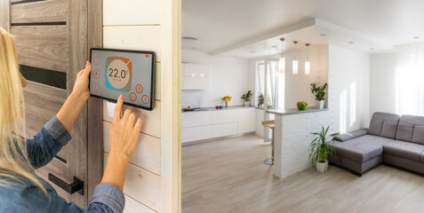 Woman using smartphone monitor to control home connectivity interface