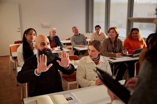 Group of adults sitting in class