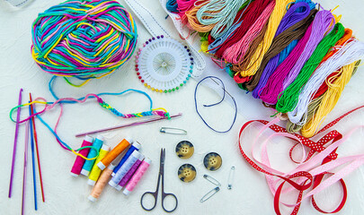 Threads and accessories for sewing and knitting. Selective focus.