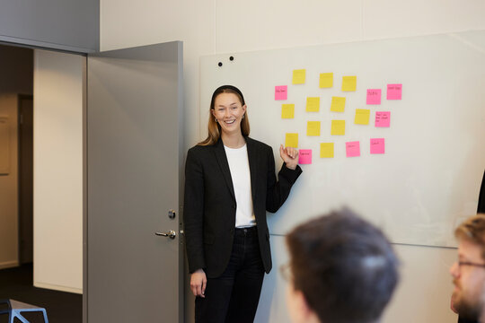 Woman having presentation during business meeting