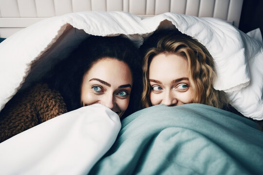 A couple of two women, married and lesbian, wake up together in bed. Ai generated.