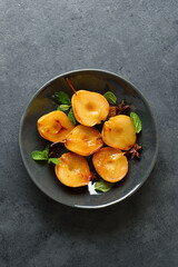 Poached pears on plate