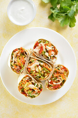 Tortilla wraps with chicken and vegetables