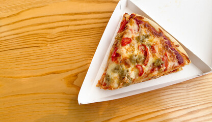 one pizza slice traditional finger gourmet food representing unhealthy eating and junk food 