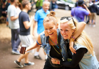Having fun with my best friend. Two friends having fun at a festival.