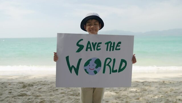 Portraits, child volunteers holding a save the world sign to promote marine environment conservation

