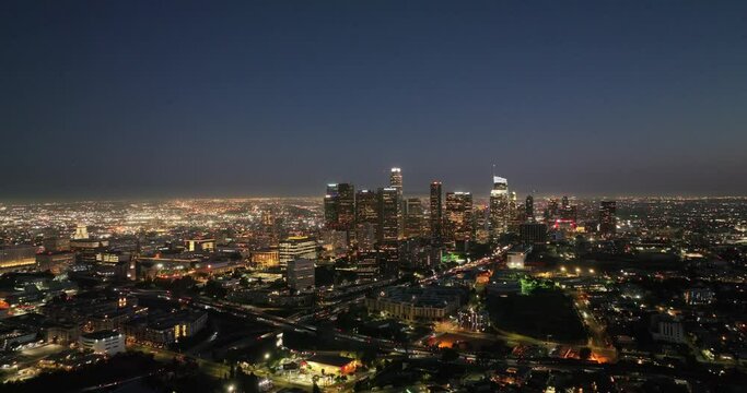 Scenic aerial view of city of downtown Los Angeles skyline at dusk night. Famous skyscrapers.