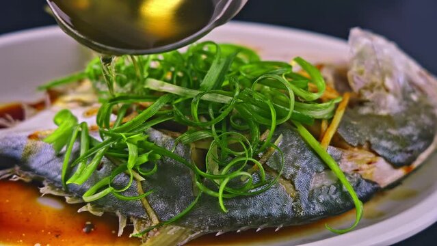 Video of a steamed golden pomfret