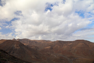 Naklejka premium Panoramic view of the Cuchillos de Vigán and the desert land of Fuerteventura